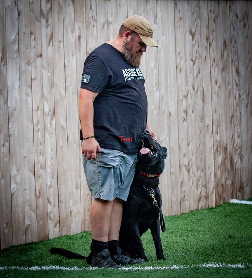 Brian with a black lab